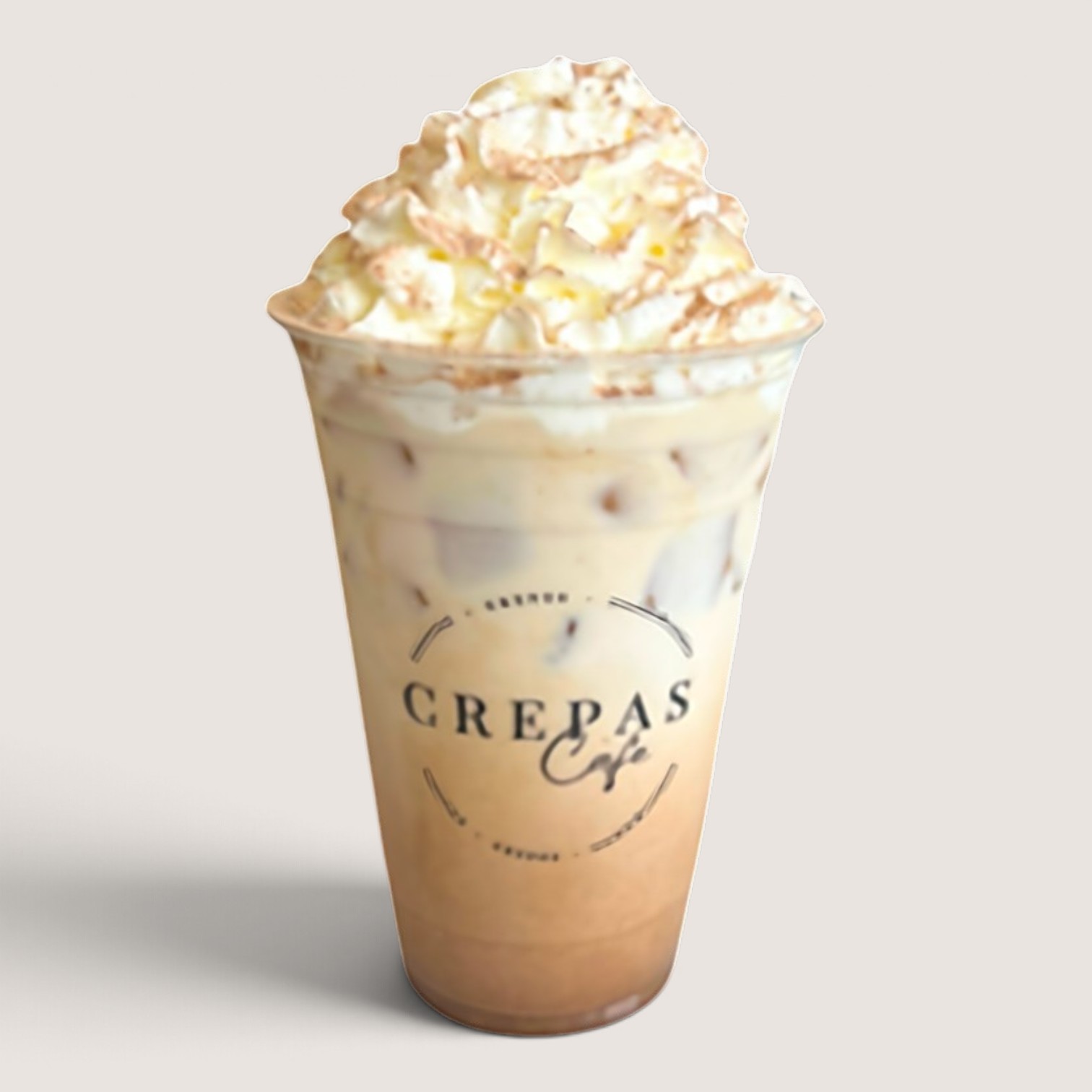 Iced Abuelita mocha with whipped cream and cinnamon