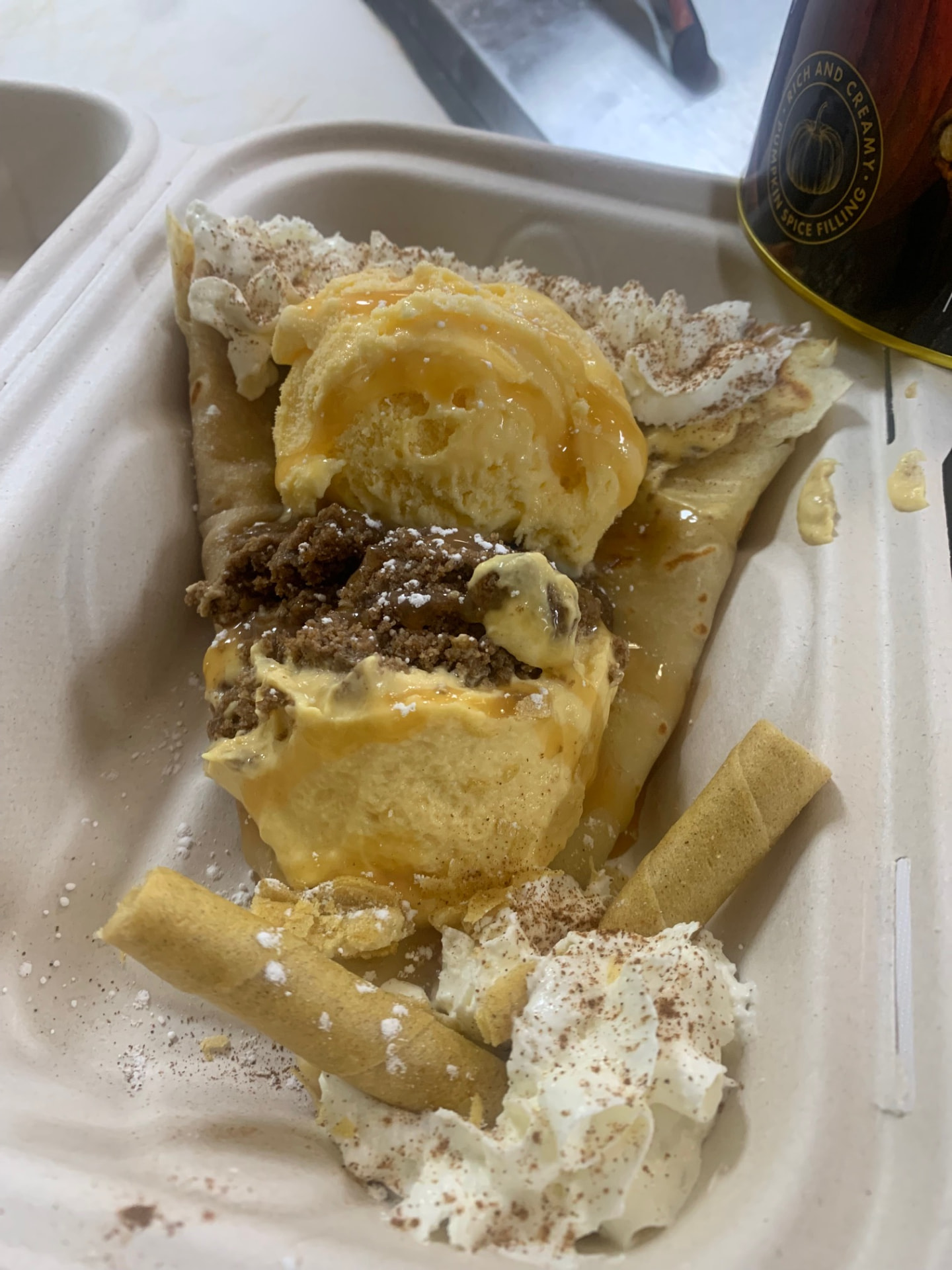 Caramel apple crêpe with ice cream and streusel